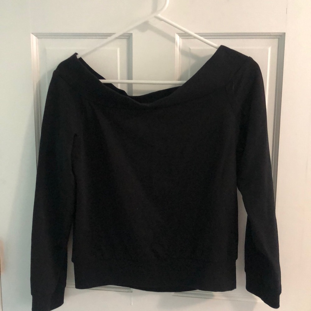 Off-the-shoulder black sweater